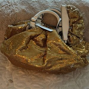 Gold bag covered with sequins